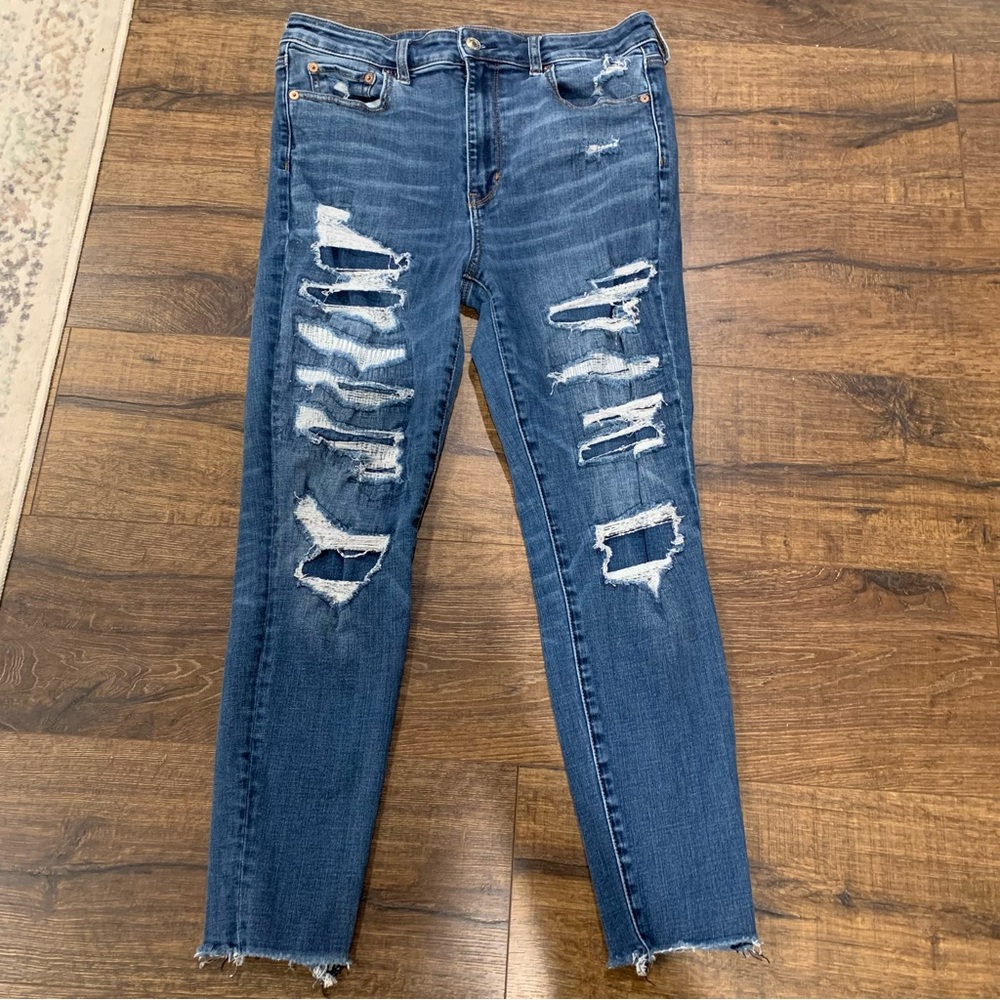 American‎ Eagle Ripped With Patches Blue Stretch Skinny Jeans. Woman’s Size 12